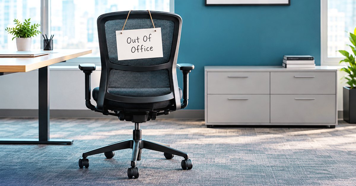 Office chair with an Out Of Office sign in an empty office